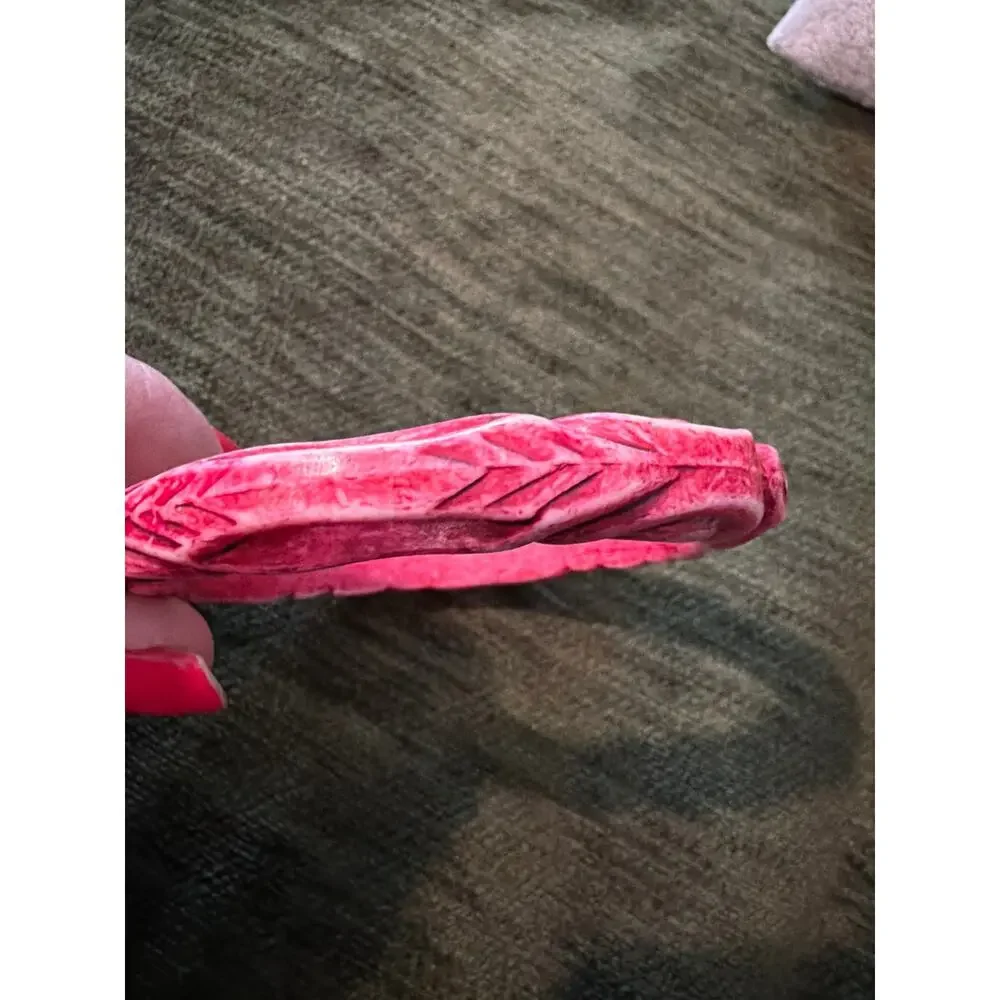 Vibrant pink carved resin bangle Art Deco-style design